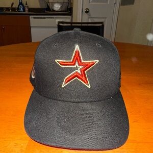 Astros hat pink brim 7 3/8 size not worn much stickers removed